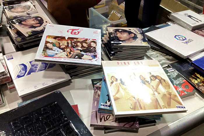  
CDs of popular K-pop artists are sold at the annual K-pop convention in the Philippines. 
